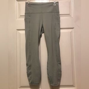 Athleta Salutation 7/8 tight with cut out detailing